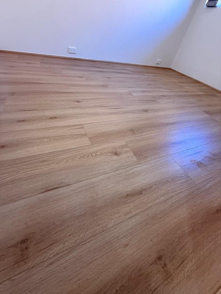 Close-up of light oak hybrid flooring planks installed in a Sydney home