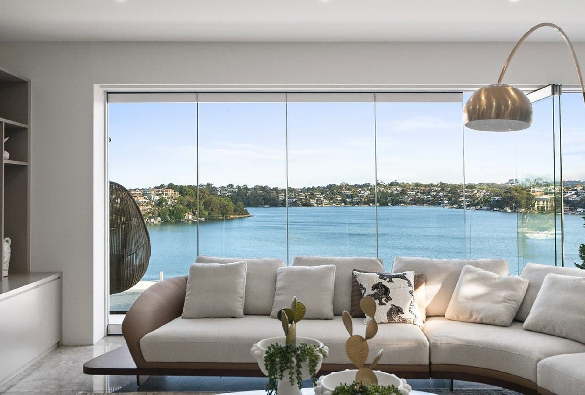 Sydney living room with harbour windows and custom furnishings